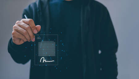 Electronic signature, document management, paperless office, E signing, signing business contract concept, metaverseの写真素材