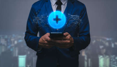 Social insurance. Auto insurance. Life insurance. virtual blue plus sign for positive thinking mindset or healthcare insurance symbol concept.の写真素材