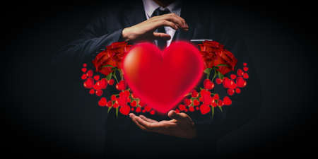 valentine's day love holding a red heart. Romantic Loveの写真素材