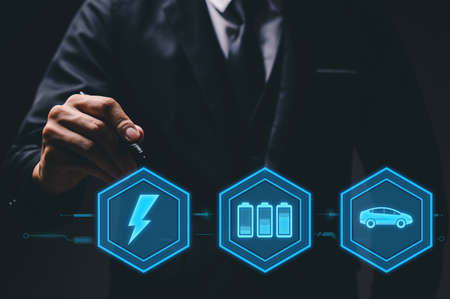 Choosing an electric vehicle. electric car choice. pointing at symbol on charging machine. electric car production Virtual Technology AR Augmented Reality or VR Virtual Reality metaverseの写真素材