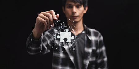 Business Find new solutions, success and strategy connecting assembling jigsaw puzzleの写真素材