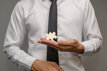 Business Find new solutions, success and strategy connecting assembling jigsaw puzzleの写真素材
