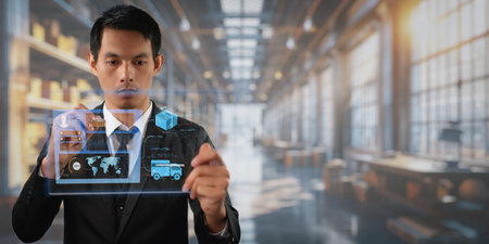 Businessman is importing and exporting goods from warehouse.の写真素材