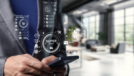 A sleek mobile shopping interface showcases sale graphics in a modern workspace. This image represents the digital retail experience and online shopping trends.の写真素材