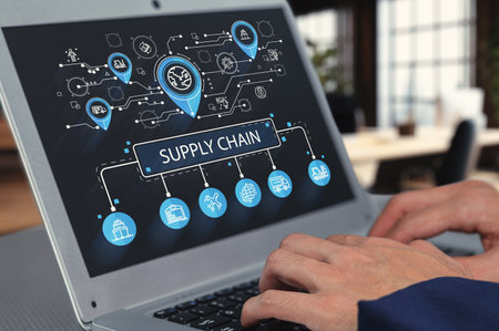 This image features a laptop displaying a detailed supply chain concept with icons. It illustrates the digital network and management strategies vital for modern logistics.の写真素材