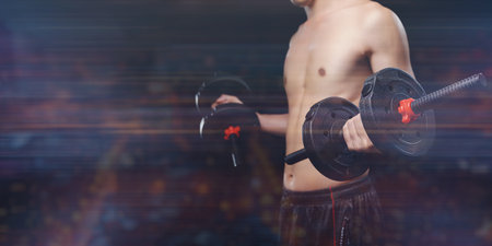 Focus on building strength and health with dumbbell workouts, showcasing a fitness enthusiast engaged in training. Emphasize dedication to wellness and personal improvement.の写真素材