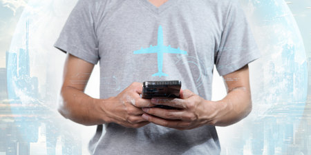 A person engaged in business travel abroad, using a smartphone for professional tasks. The modern digital environment reflects the integration of technology in global business.の写真素材