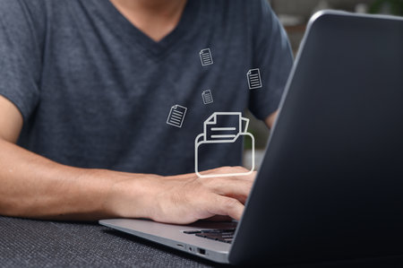 People are increasingly adopting digital documents for their efficiency and ease of use, transforming workflows and promoting a paperless environment in modern offices.の写真素材
