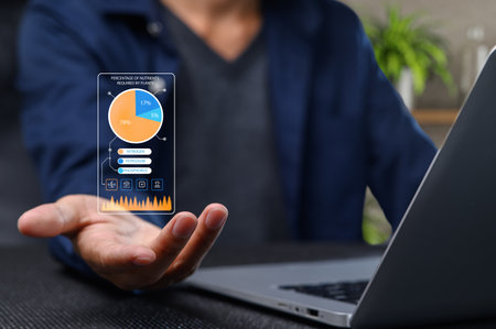 A digital interface showcasing sustainability metrics and technology insights in a modern workspace. Experience the fusion of data and innovation for a better future.の写真素材