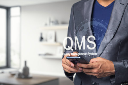 A professional man in a suit engages with a smartphone, representing the concept of quality...
