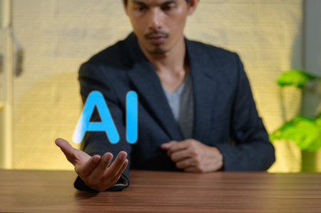 A professional man in a suit displays an AI concept with floating text in an innovative workspace, symbolizing technology and futuristic ideas.の写真素材