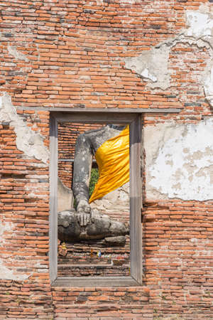 Point of view buddha from window in templeの写真素材