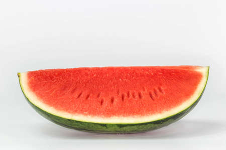 watermelon slice closeup on white background.の写真素材