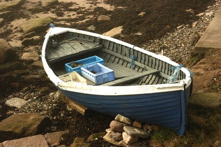 Beached rowing boat at Berwick upon Tweedの写真素材