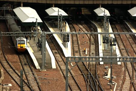 A view of the west side of Edinburgh Waverley Railway Station. The Waverley station lies in the centre of the City of Edinburgh between the Old and New Town areas.の写真素材