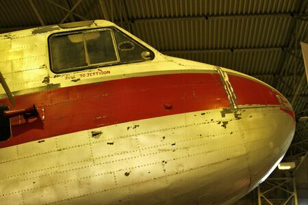 Nose of an old plane with peeling paint liveryの写真素材