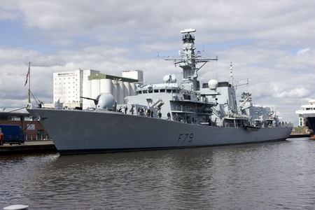 HMS Portland at Leith, Edinburgh, Scotland. HMS Portland is a type 23 Duke Class Frigate. Launched on the River Clyde in 1999. It is 133 metres long and has a displacement of 4,900 tonnes. Formerly used as anti-submarine ship.のeditorial素材