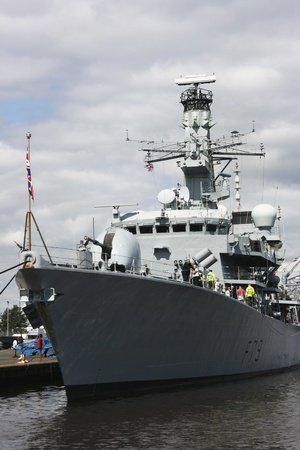 HMS Portland at Leith, Edinburgh, Scotland. HMS Portland is a type 23 Duke Class Frigate. Launched on the River Clyde in 1999. It is 133 metres long and has a displacement of 4,900 tonnes. Formerly used as anti-submarine ship.のeditorial素材
