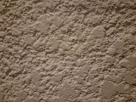 Texture of an old wall covered with plaster. Abstract background for design.
