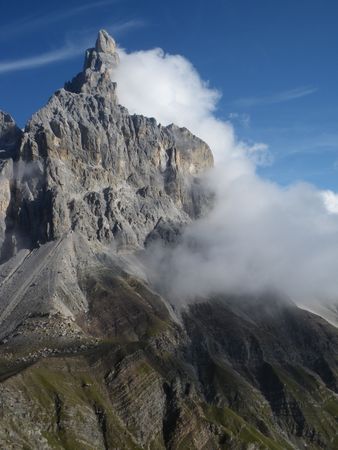 Smoke on the tip of dolomitesの写真素材