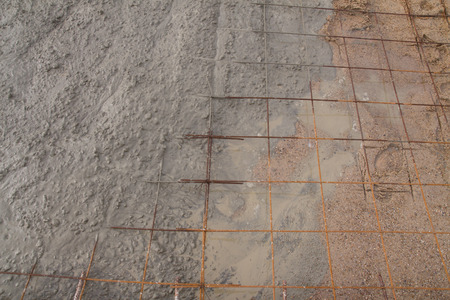 Pouring cement during sidewalk upgradeの写真素材