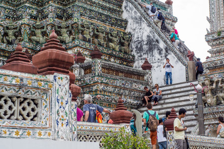 Bangkok, Thailand - August 2, 2013   European travelers go to Wat Arun  on August 2, 2013  in...