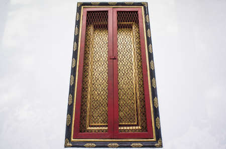 Temple door in Wat Pichaya-yatogaram Bangkok Thailandの写真素材