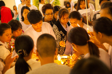 Bangkok, Thailand - October 5, 2013 : Unidentified Thai Buddhist people are worshiping to Buddha  on...