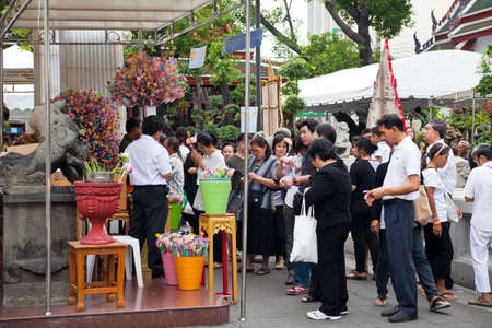 Bangkok, Thailand - October 25, 2013 : Thai people donate banknote on the King of Thai monk, patriarch's funeral day on October 25, 2013  in Bangkok, Thailand   のeditorial素材