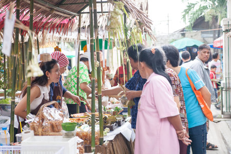 Bangkok, Thailand - October 20, 2013   Unidentified Thai people shopping at retro maket  with flower on October 20, 2013 のeditorial素材