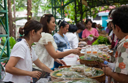 Bangkok, Thailand - October 20, 2013   Unidentified Thai people shopping at retro maket  with flower on October 20, 2013 のeditorial素材
