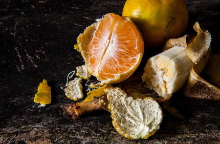 Fine art still life with fruit,  orange and bananaの写真素材