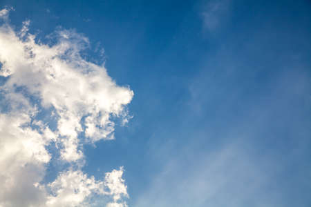 Blue Sky, white clouds and sun light for Bangkok Thailandの写真素材