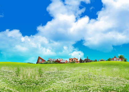 Green fields under cloudy sky during daytime.の写真素材