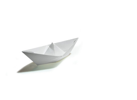 Paper boat isolated on white background, origami paper boat isolated on white backgroundの写真素材