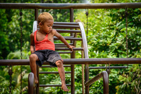 bipsy boy play in the park, Yangon, Myanmar, 21-may-2017のeditorial素材