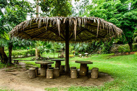 straw umbrella in the park, Myanmar, June-2017の写真素材