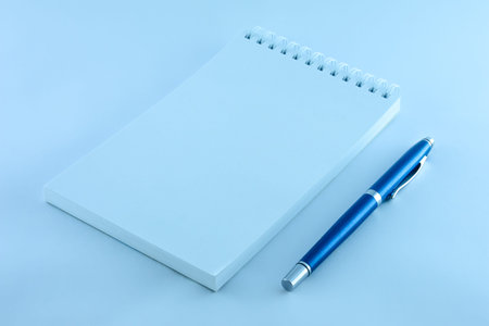 notepad and pen to recordの写真素材