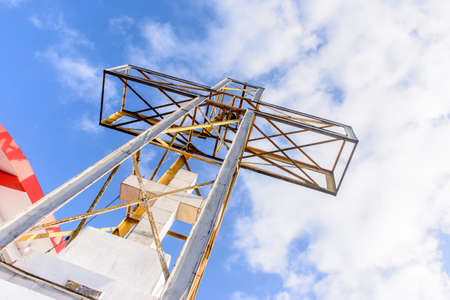 the cross with the blue sky and cloudの写真素材