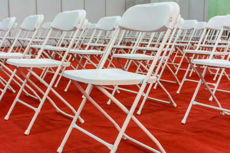 closeup photo of white chairsの写真素材