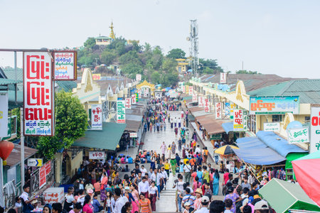 shops and houses on the Kyaik Htee Yoe mountain, Mon State, Myanmar. People are crowded. March-2018