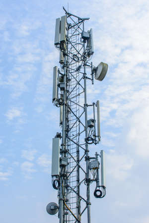 mobile telecom tower with blue skyの写真素材