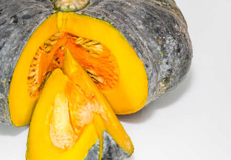 Huge Pumpkin was indented in a quarter and two pieces of its.の写真素材