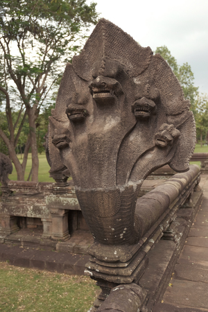 Naga or big snake is Khmer art make form sand stone crave for decorate ancient architecture Phanom-rung stone castle in Buri-ram provinc Thailand about 1,500 years ago.のeditorial素材