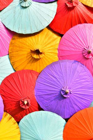 Full frame umbrellas are vary colorful background.の写真素材