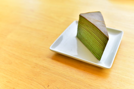 Green tea layers cake very delicious in coffee shop, Very good holiday.
