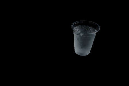 Cold water on the black background for create your work.の写真素材