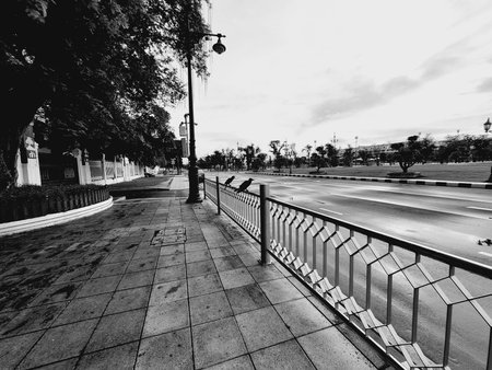 The road in Bangkok. Empty road and empty sidewalk after rain in the morning, No journey and...
