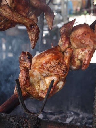 fire chicken with honey on fireの写真素材