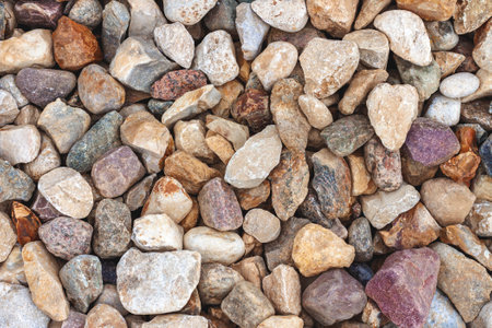 Background from multicolored rough rubble close upの写真素材